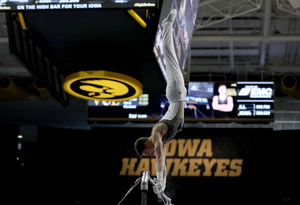 Iowa’s Mitch Mandozzi competes on the high bar against Illinois Sunday, March 1, 2020 at Carver-Hawkeye Arena. (Brian Ray/hawkeyesports.com)