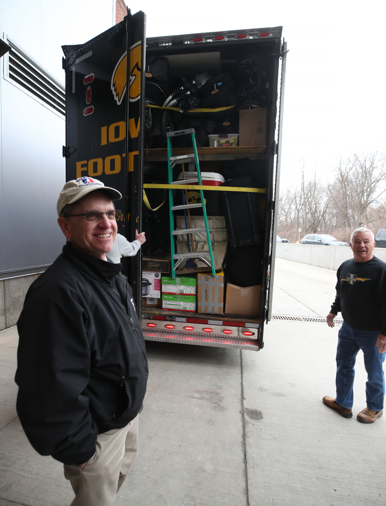 TanTara Transportation Corporation President Mike Riggan and head football equipment manager Greg Morris prepare to lock up the trailer before departing for Tampa, Florida Friday, December 21, 2018 at the Hansen Football Performance Center. (Brian Ray/hawkeyesports.com)