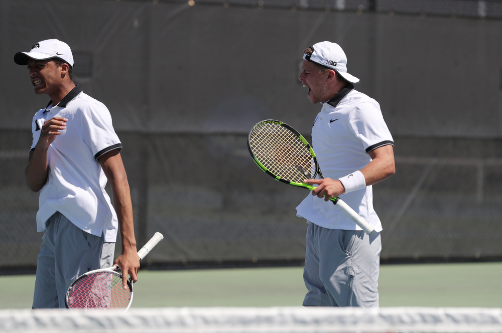 IowaÕs Oliver Okonkwo and Will Davies play a doubles match against the Michigan Wolverines Sunday, April 21, 2019 at the Hawkeye Tennis and Recreation Complex. (Brian Ray/hawkeyesports.com)