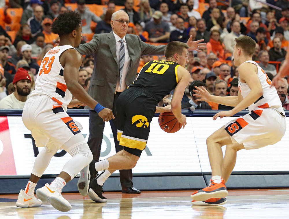 Iowa Hawkeyes guard Joe Wieskamp (10) drives with the ball during the first half of their ACC/Big Ten Challenge game at the Carrier Dome in Syracuse, N.Y. on Tuesday, Dec 3, 2019. (Stephen Mally/hawkeyesports.com)