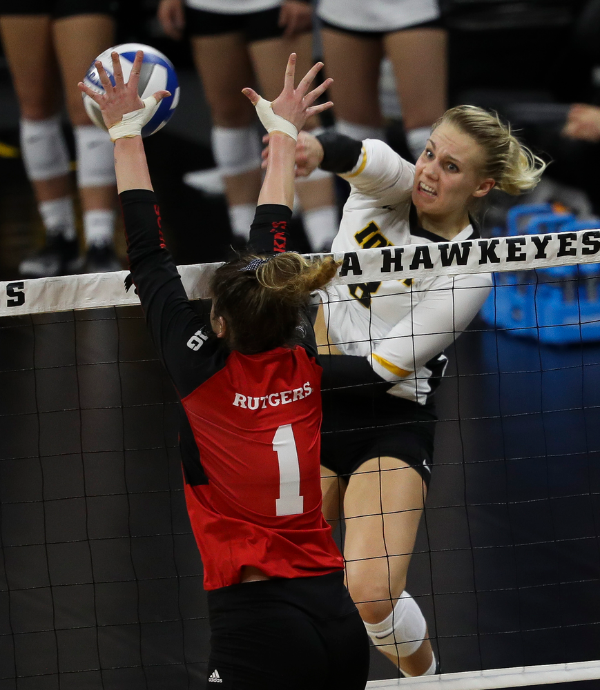 Iowa Hawkeyes right side hitter Reghan Coyle (8) spikes the ball during a match against Rutgers at Carver-Hawkeye Arena on November 2, 2018. (Tork Mason/hawkeyesports.com)