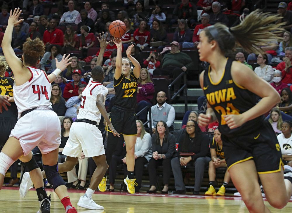 Iowa guard Kathleen Doyle (22) makes a 3-pointer during the fourth quarter of their game at the Rutgers Athletic Center in Piscataway, N.J. on Sunday, March 1, 2020. (Stephen Mally/hawkeyesports.com)