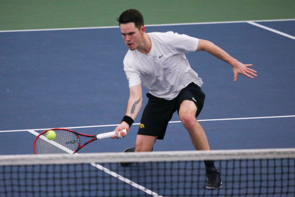 Iowa's Jonas Larsen at a tennis match vs Drake Friday, March 8, 2019 at the Hawkeye Tennis and Recreation Complex. (Lily Smith/hawkeyesports.com)