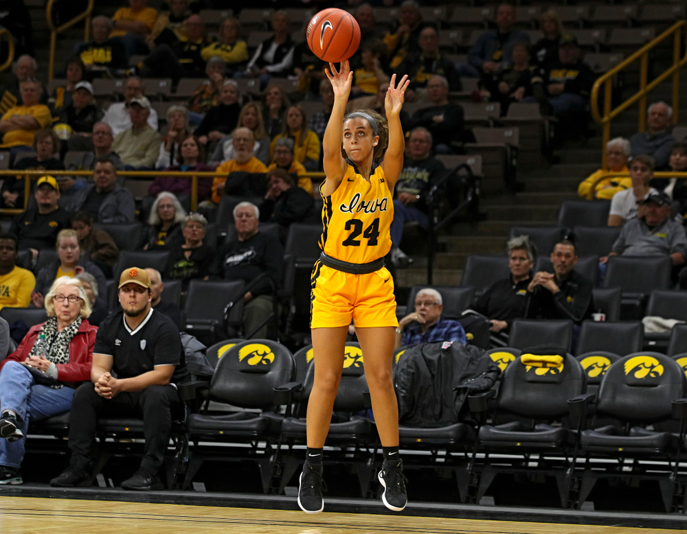Iowa guard Gabbie Marshall (24) makes a 3-pointer during the second quarter of their game against Winona State at Carver-Hawkeye Arena in Iowa City on Sunday, Nov 3, 2019. (Stephen Mally/hawkeyesports.com)