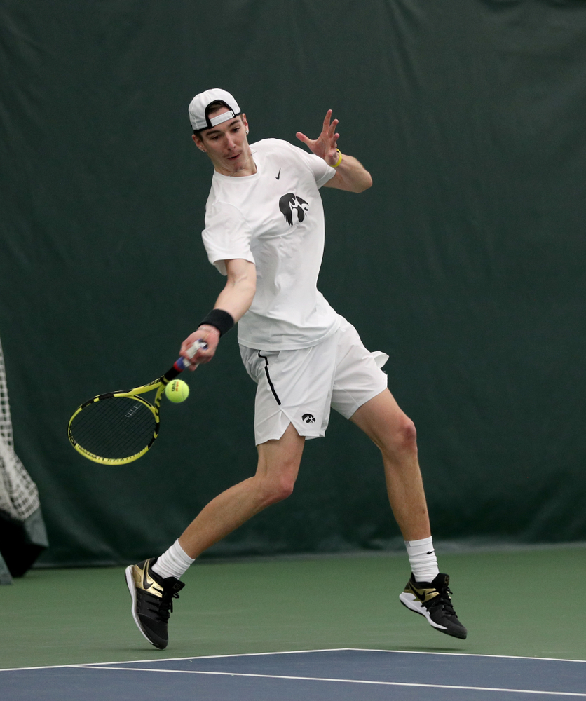 Iowa’s Nikita Snezhko against Cornell Sunday, March 8, 2020 at the Hawkeye Tennis and Recreation Center. (Brian Ray/hawkeyesports.com)