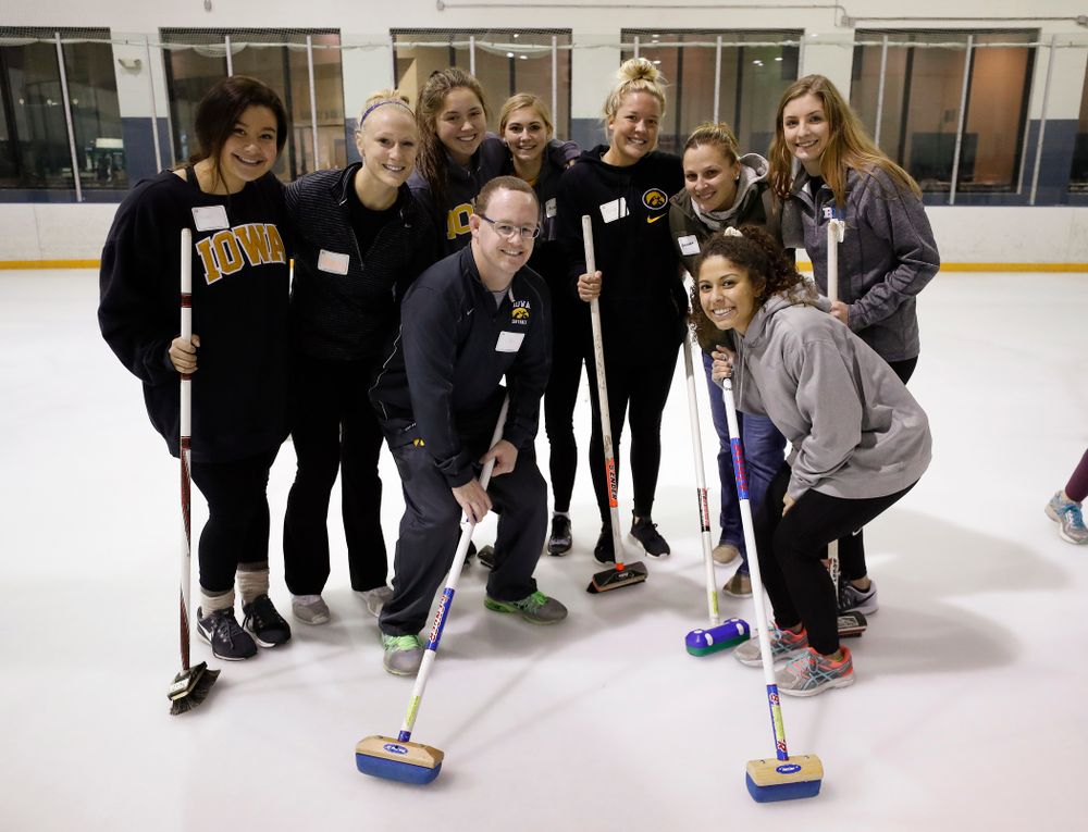 Members of the Iowa Softball team learn the sport of curling as part of a team building event Wednesday, January 10, 2018 at the Cedar Rapids Ice Arena. (Brian Ray/hawkeyesports.com)