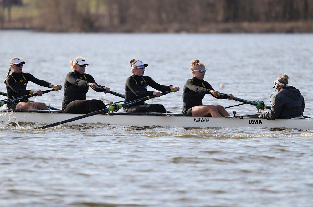 Iowa's Hunter Koenigsfeld (from left), Contessa Harold, Katie Pearson, Eve Stewart, and Logan Jones during their I Varsity 8 race against Minnesota in their Big Ten Double Dual Rowing Regatta at Lake Macbride in Solon on Saturday, Apr. 13, 2019. (Stephen Mally/hawkeyesports.com)