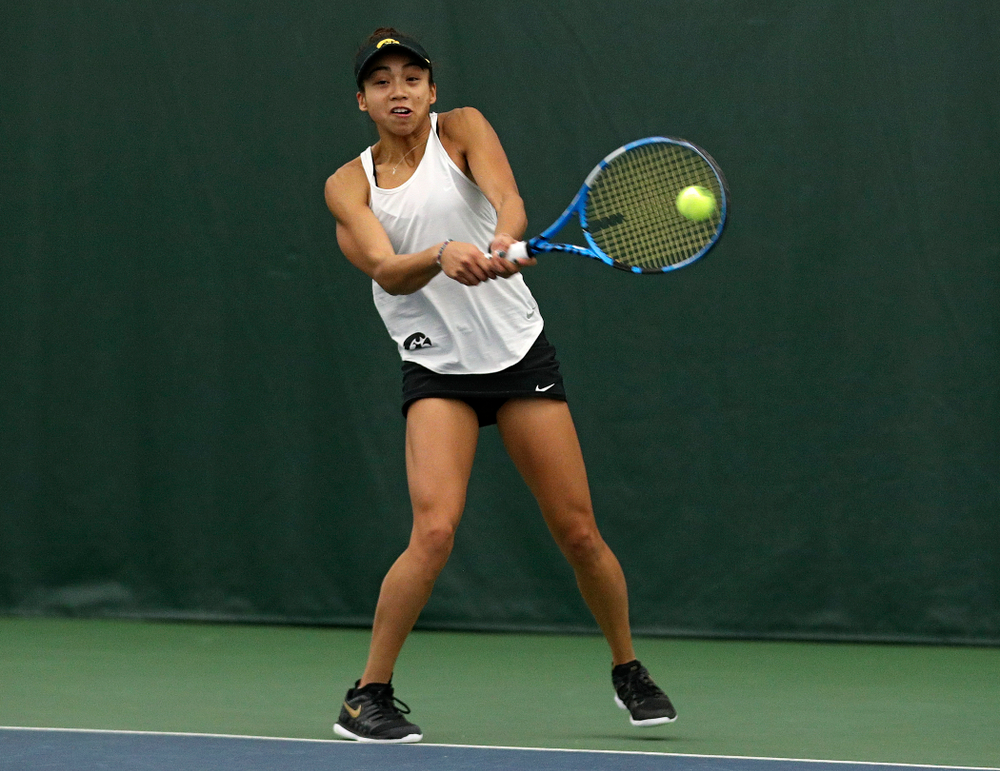 Iowa’s Michelle Bacalla returns a shot during her singles match at the Hawkeye Tennis and Recreation Complex in Iowa City on Sunday, February 23, 2020. (Stephen Mally/hawkeyesports.com)