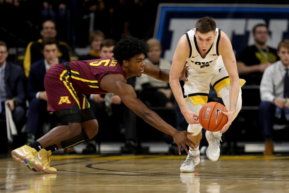 Iowa Hawkeyes guard CJ Fredrick (5) against the Minnesota Golden Gophers Monday, December 9, 2019 at Carver-Hawkeye Arena. (Brian Ray/hawkeyesports.com)