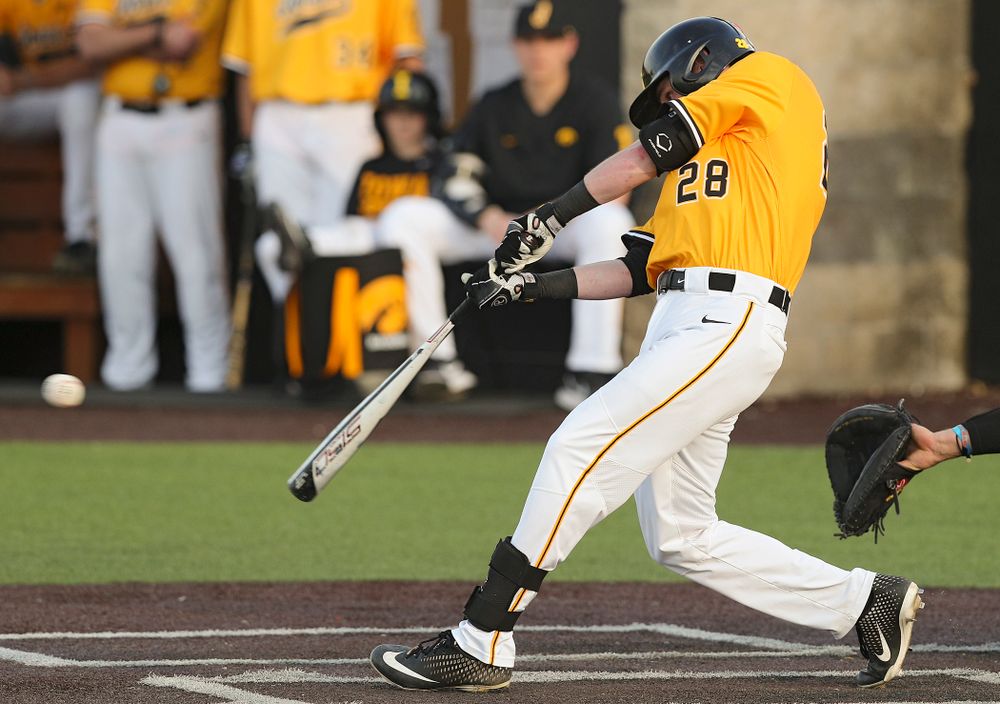 Iowa Hawkeyes left fielder Chris Whelan (28) gets a hit during the sixth inning of their game against Northern Illinois at Duane Banks Field in Iowa City on Tuesday, Apr. 16, 2019. (Stephen Mally/hawkeyesports.com)