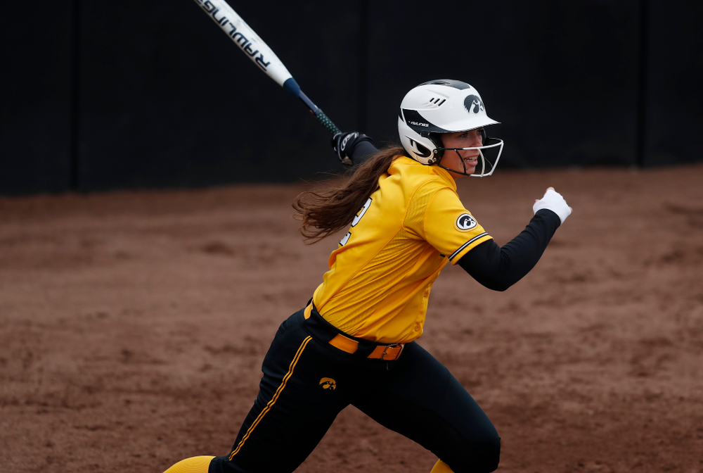 Iowa Hawkeyes catcher Angela Schmiederer (12) against UW Green Bay Tuesday, March 27, 2018 at Bob Pearl Field. (Brian Ray/hawkeyesports.com)