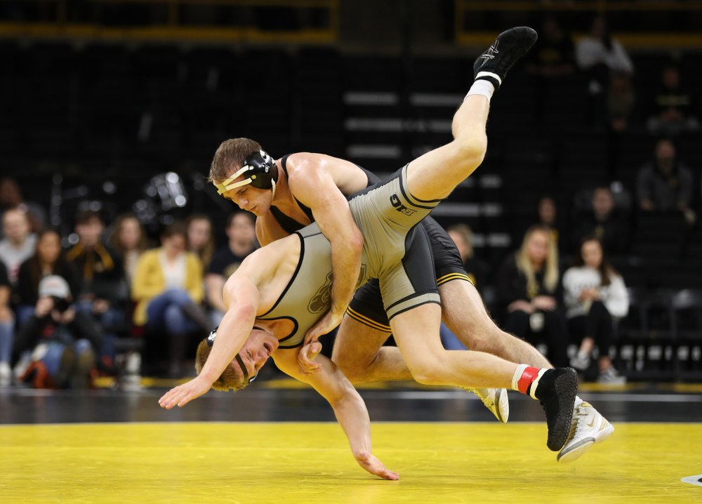 Iowa's Carter Happel wrestles Purdue's Parker Filius at 149 pounds Saturday, November 24, 2018 at Carver-Hawkeye Arena. (Brian Ray/hawkeyesports.com)