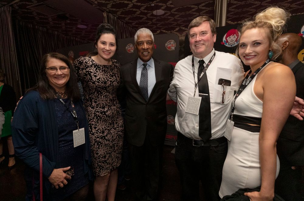 Iowa Hawkeyes forward Megan Gustafson (10) and her family with NBA great Julius Erving before the ESPN College Basketball Awards show Friday, April 12, 2019 at The Novo at LA Live. (Brian Ray/hawkeyesports.com)