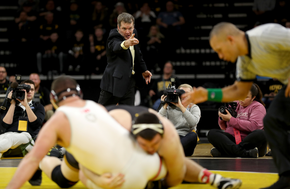 Head Coach Tom Brands works the edge of the mat as Iowa’s Tony Cassioppi wrestles Ohio State’s Gary Traub at heavyweight Friday, January 24, 2020 at Carver-Hawkeye Arena. Cassioppi won the match 9-3. (Brian Ray/hawkeyesports.com)