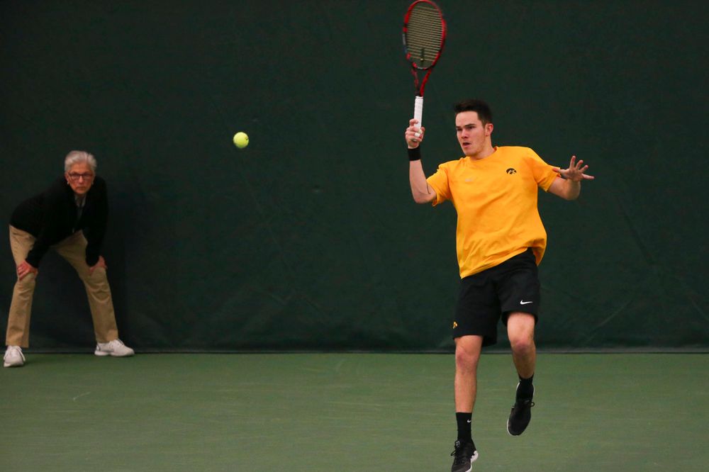 Iowa's Jonas Larsen at a tennis match vs Drake Friday, March 8, 2019 at the Hawkeye Tennis and Recreation Complex. (Lily Smith/hawkeyesports.com)