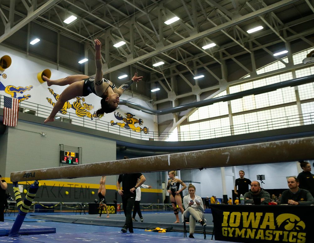 Misty Jade Carlson competes on the balance beam during the Black and Gold Intrasquad meet at the Field House on 12/2/17. (Tork Mason/hawkeyesports.com)