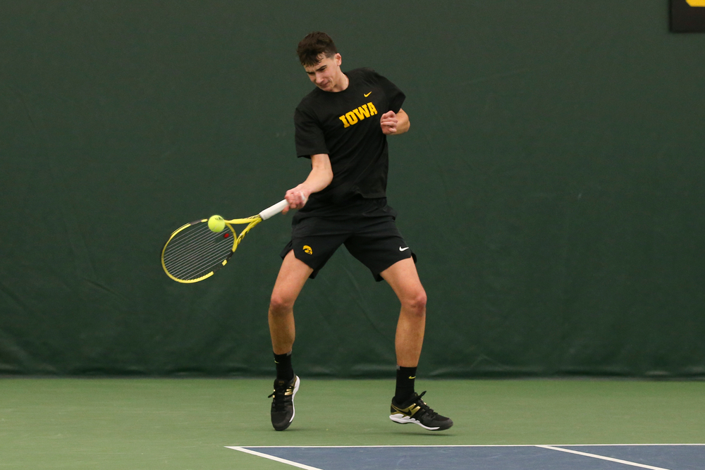 Iowa’s Matt Clegg returns a ball during the Iowa men’s tennis meet vs VCU on Saturday, February 29, 2020 at the Hawkeye Tennis and Recreation Complex. (Lily Smith/hawkeyesports.com)
