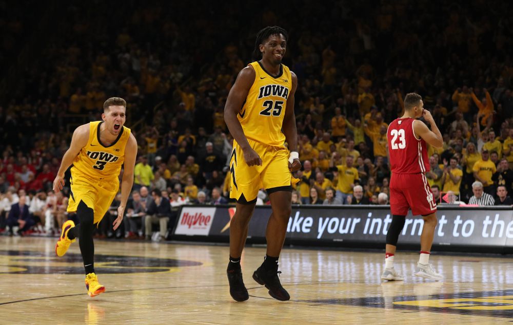 Iowa Hawkeyes guard Jordan Bohannon (3) and forward Tyler Cook (25) against the Wisconsin Badgers Friday, November 30, 2018 at Carver-Hawkeye Arena. (Brian Ray/hawkeyesports.com)