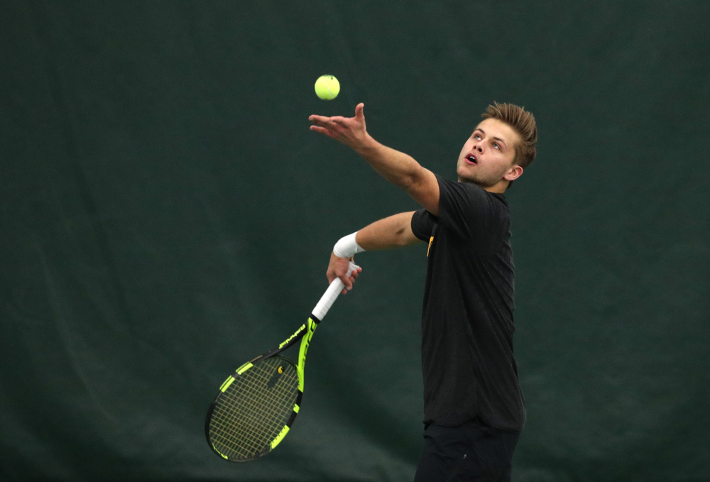 Will Davies and Oliver Okonkwo plays a doubles match against the Miami Hurricanes Friday, February 8, 2019 at the Hawkeye Tennis and Recreation Complex. (Brian Ray/hawkeyesports.com)