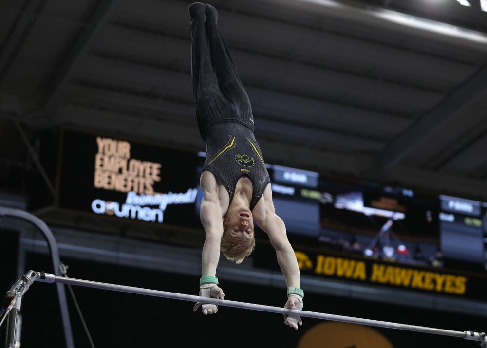 Iowa's Nick Merryman competes on the high bar against the Ohio State Buckeyes Saturday, March 16, 2019 at Carver-Hawkeye Arena. (Brian Ray/hawkeyesports.com)