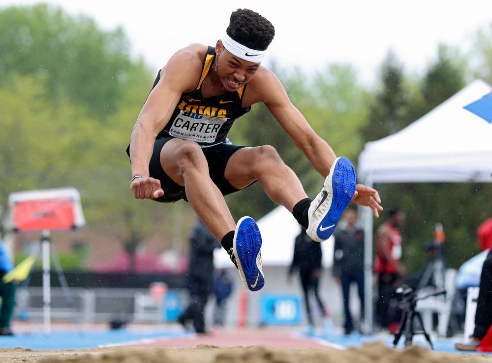 Iowa's James Carter jumps in the men’s long jump event on the second day of the Big Ten Outdoor Track and Field Championships at Francis X. Cretzmeyer Track in Iowa City on Saturday, May. 11, 2019. (Stephen Mally/hawkeyesports.com)
