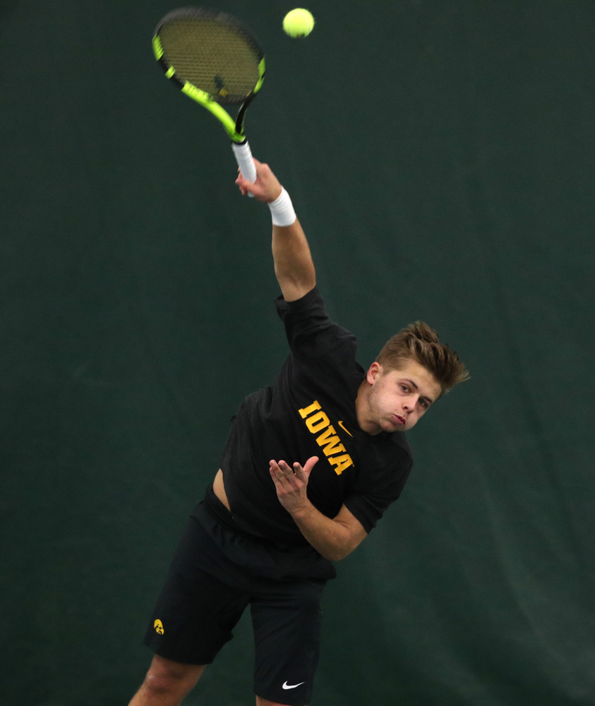 Will Davies and Oliver Okonkwo plays a doubles match against the Miami Hurricanes Friday, February 8, 2019 at the Hawkeye Tennis and Recreation Complex. (Brian Ray/hawkeyesports.com)