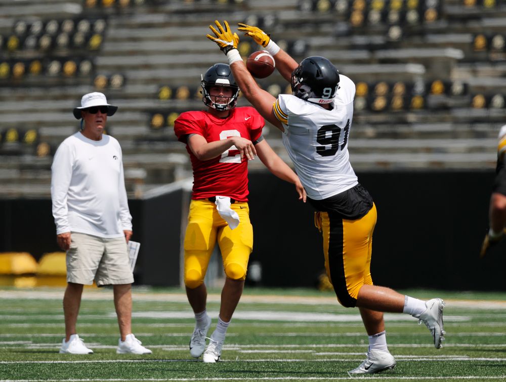 Iowa Hawkeyes quarterback Peyton Mansell (2) and defensive lineman Brady Reiff (91) during Kids Day Saturday, August 11, 2018 at Kinnick Stadium. (Brian Ray/hawkeyesports.com)