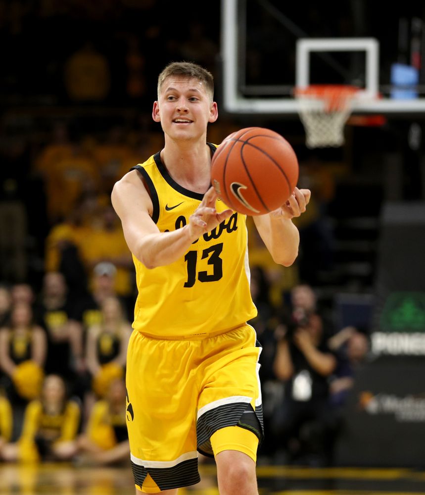 Iowa Hawkeyes guard Austin Ash (13) against the Nebraska Cornhuskers Saturday, February 8, 2020 at Carver-Hawkeye Arena. (Brian Ray/hawkeyesports.com)