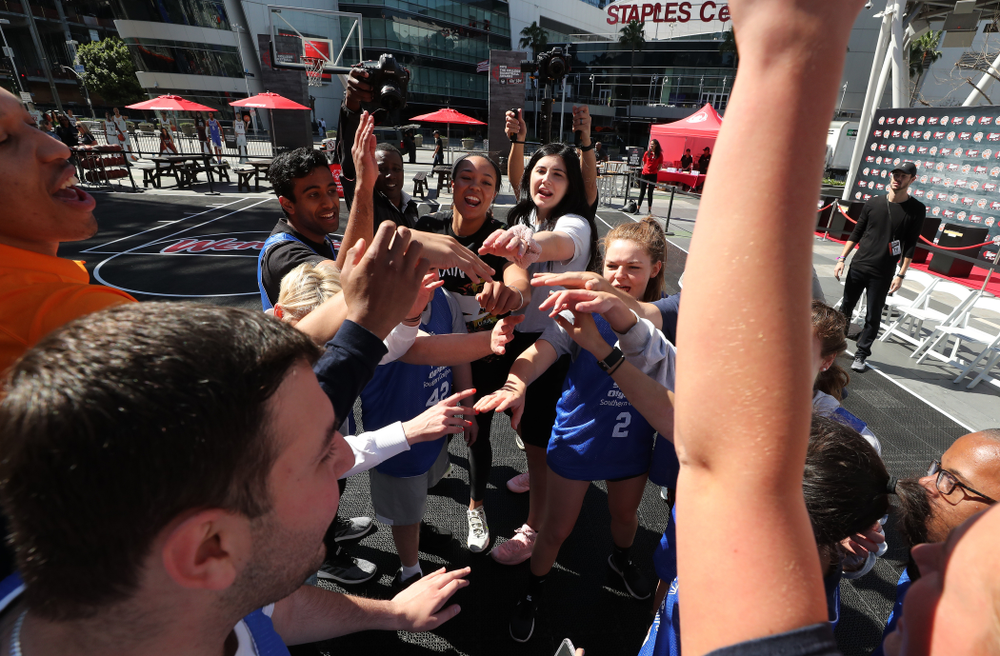 Iowa Hawkeyes forward Megan Gustafson (10) and UCONNÕs Napheesa Collier during a Special Olympics event Friday, April 12, 2019 as part of the ESPN College Basketball Awards in the XBOX Plaza at LA Live. (Brian Ray/hawkeyesports.com)