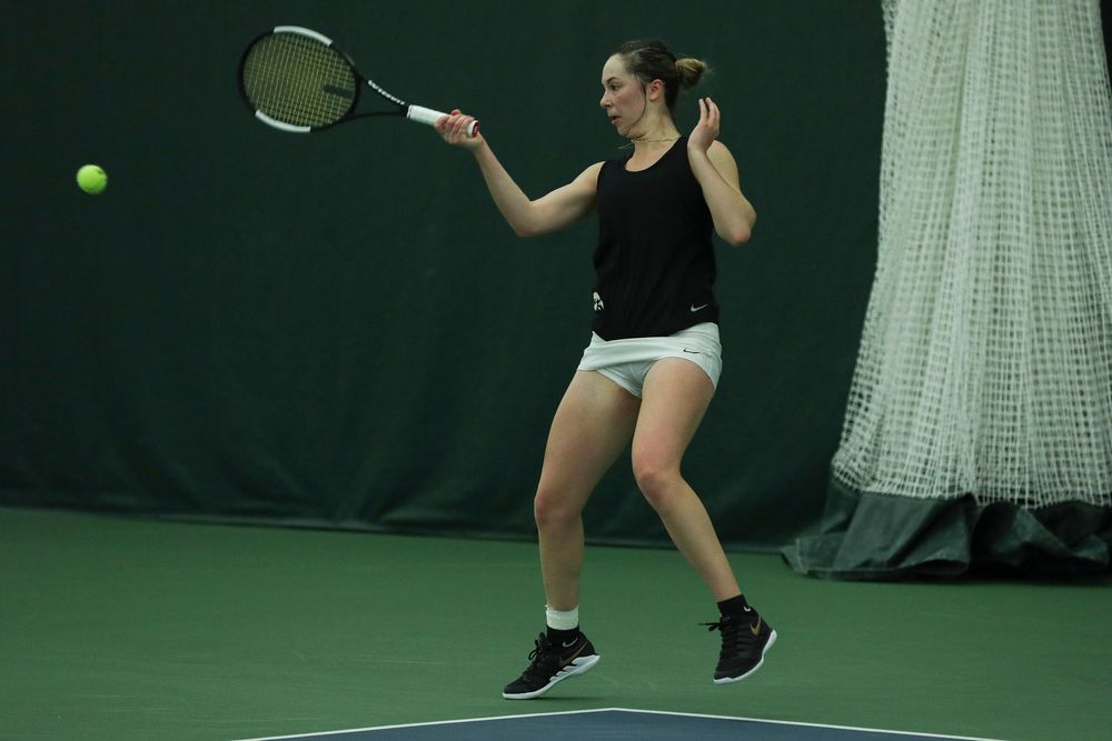 Iowa’s Samantha Mannix returns a hit during the Iowa women’s tennis meet vs DePaul on Friday, February 21, 2020 at the Hawkeye Tennis and Recreation Complex. (Lily Smith/hawkeyesports.com)