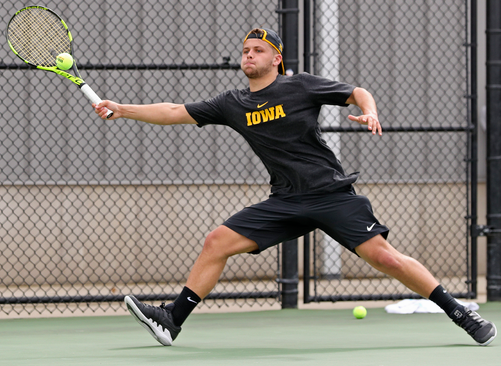 Iowa's Will Davies competes during a match against Ohio State at the Hawkeye Tennis and Recreation Complex in Iowa City on Sunday, Apr. 7, 2019. (Stephen Mally/hawkeyesports.com)