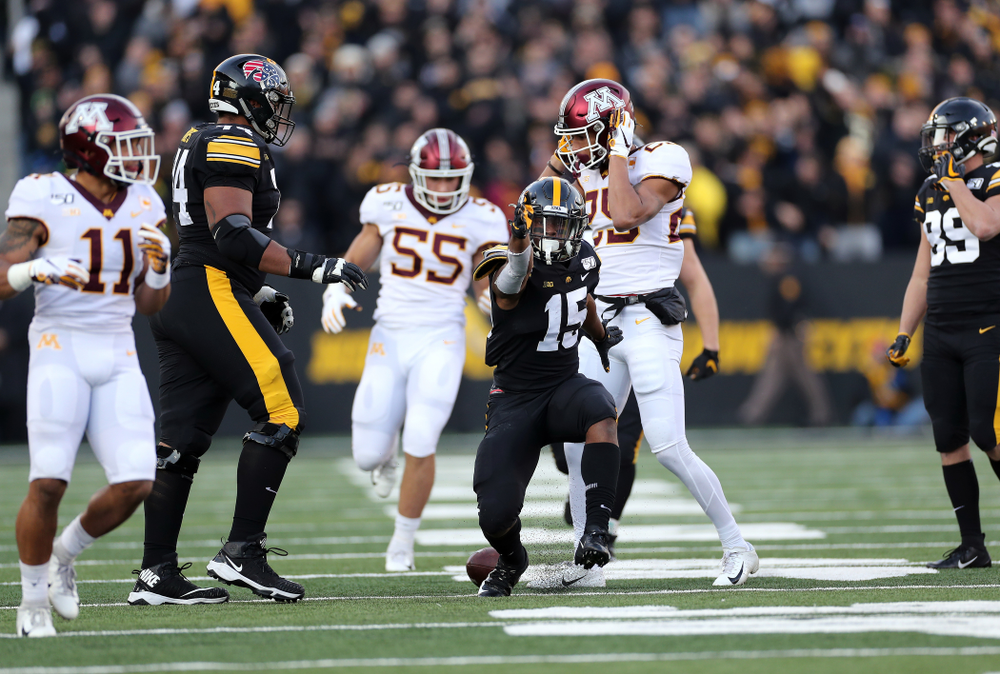 Iowa Hawkeyes running back Tyler Goodson (15) picks up a first down against the Minnesota Golden Gophers Saturday, November 16, 2019 at Kinnick Stadium. (Brian Ray/hawkeyesports.com)