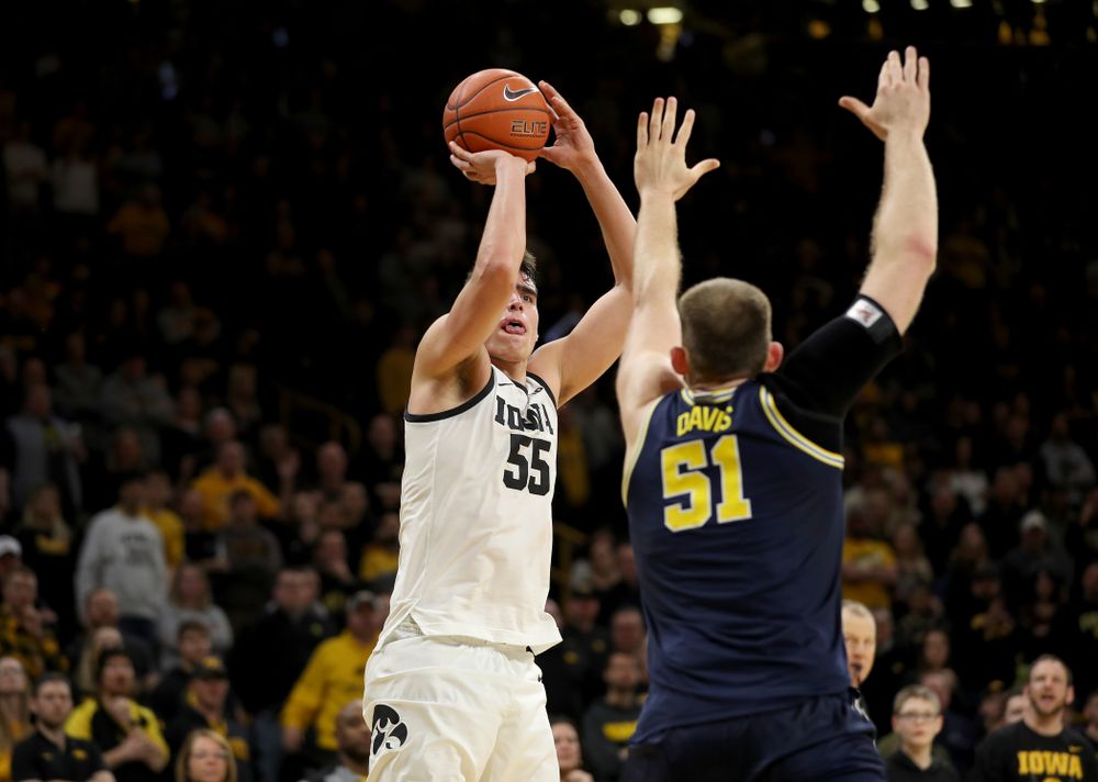 Iowa Hawkeyes forward Luka Garza (55) knocks down a shot against the Michigan Wolverines Friday, January 17, 2020 at Carver-Hawkeye Arena. (Brian Ray/hawkeyesports.com)