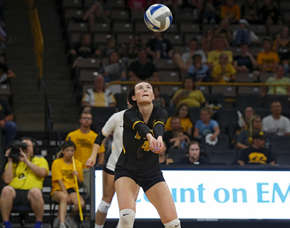 Iowa’s Halle Johnston (4) eyes the ball during the third set of their Big Ten/Pac-12 Challenge match against Colorado at Carver-Hawkeye Arena in Iowa City on Friday, Sep 6, 2019. (Stephen Mally/hawkeyesports.com)