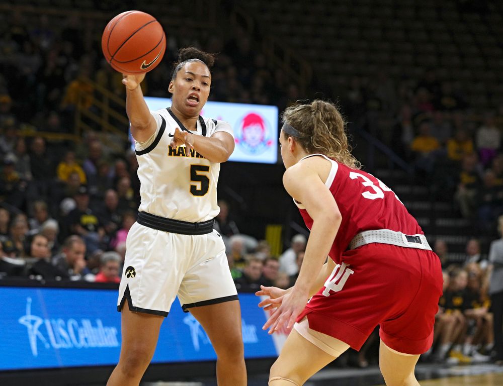 Iowa Hawkeyes guard Alexis Sevillian (5) passes the ball during the first quarter of their game at Carver-Hawkeye Arena in Iowa City on Sunday, January 12, 2020. (Stephen Mally/hawkeyesports.com)