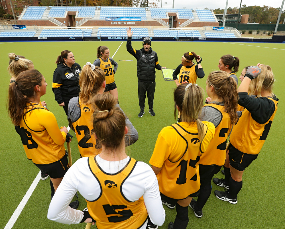 Iowa assistant coach Michael Boal talks with his team as head coach Lisa Cellucci looks on during their practice at Karen Shelton Stadium in Chapel Hill, N.C. on Thursday, Nov 14, 2019. (Stephen Mally/hawkeyesports.com)