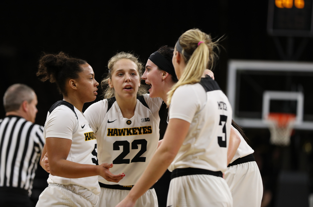 Iowa Hawkeyes forward Megan Gustafson (10), guard Kathleen Doyle (22), forward Hannah Stewart (21), guard Alexis Sevillian (5), and Makenzie Meyer against the Nebraska Cornhuskers Thursday, January 3, 2019 at Carver-Hawkeye Arena. (Brian Ray/hawkeyesports.com)