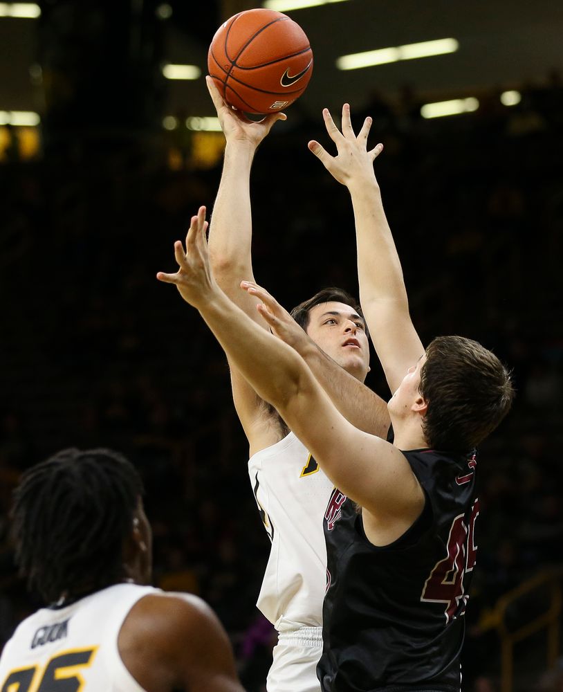 Iowa Hawkeyes forward Ryan Kriener (15) puts up a shot during a game against Guilford College at Carver-Hawkeye Arena on November 4, 2018. (Tork Mason/hawkeyesports.com)