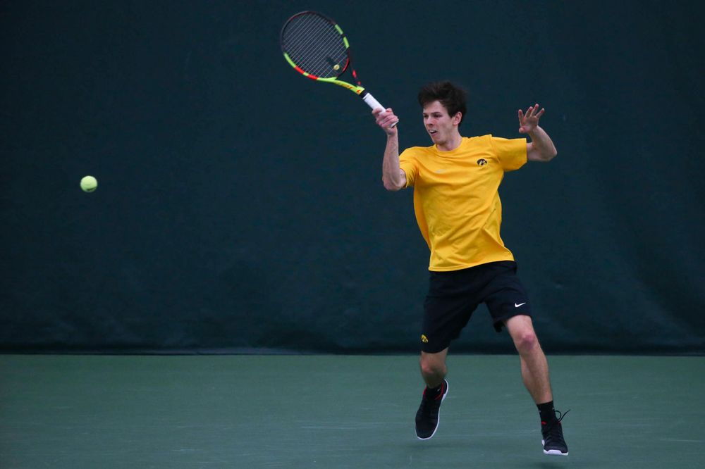 Iowa's Joe Tyler at a tennis match vs Drake Friday, March 8, 2019 at the Hawkeye Tennis and Recreation Complex. (Lily Smith/hawkeyesports.com)