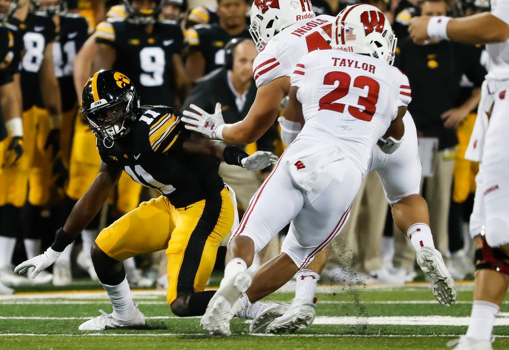 Iowa Hawkeyes defensive back Michael Ojemudia (11) holds the edge during a game against Wisconsin at Kinnick Stadium on September 22, 2018. (Tork Mason/hawkeyesports.com)