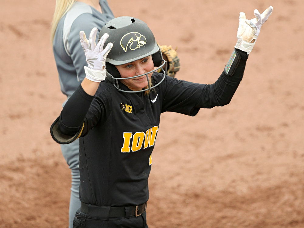 Iowa’s Aralee Bogar (2) shrugs her shoulders after driving in two runs with a hit during the fourth inning of their game against Iowa Softball vs Indian Hills Community College at Pearl Field in Iowa City on Sunday, Oct 6, 2019. (Stephen Mally/hawkeyesports.com)