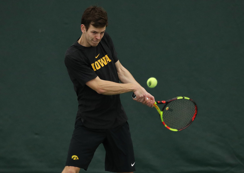 Iowa's Piotr Smietana against UMKC Friday, February 15, 2019 at the Hawkeye Tennis and Recreation Complex. (Brian Ray/hawkeyesports.com)
