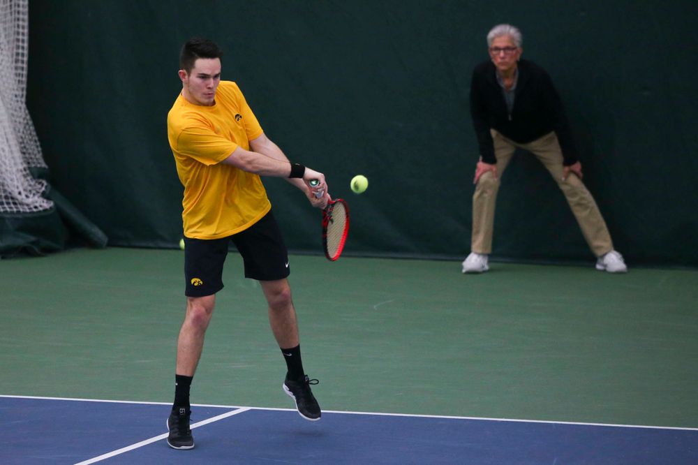 Jonas Larsen at a tennis match vs Drake Friday, March 8, 2019 at the Hawkeye Tennis and Recreation Complex. (Lily Smith/hawkeyesports.com)
