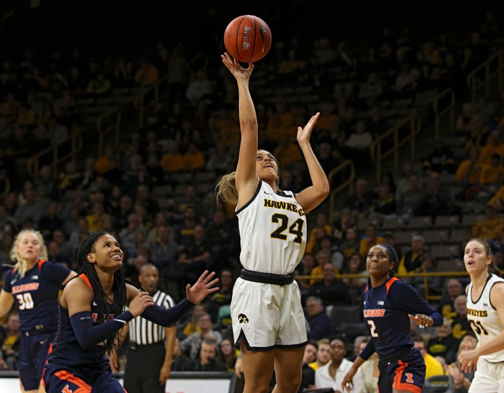 Iowa Hawkeyes guard Gabbie Marshall (24) score a basket during the fourth quarter of their game at Carver-Hawkeye Arena in Iowa City on Tuesday, December 31, 2019. (Stephen Mally/hawkeyesports.com)