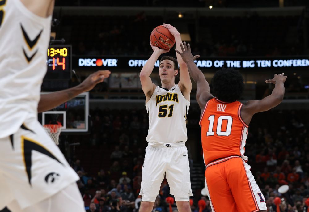 Iowa Hawkeyes forward Nicholas Baer (51) against the Illinois Fighting Illini in the 2019 Big Ten Men's Basketball Tournament Thursday, March 14, 2019 at the United Center in Chicago. (Brian Ray/hawkeyesports.com)