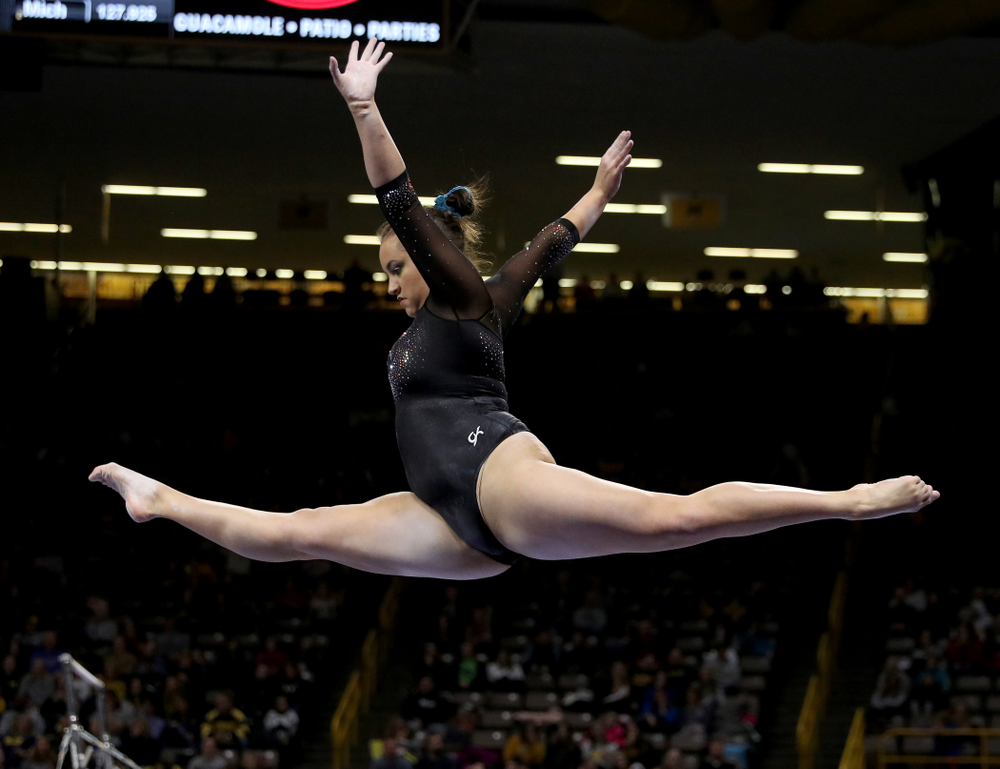 Iowa’s Dani Castillo competes on the beam against Michigan Friday, February 14, 2020 at Carver-Hawkeye Arena. (Brian Ray/hawkeyesports.com)