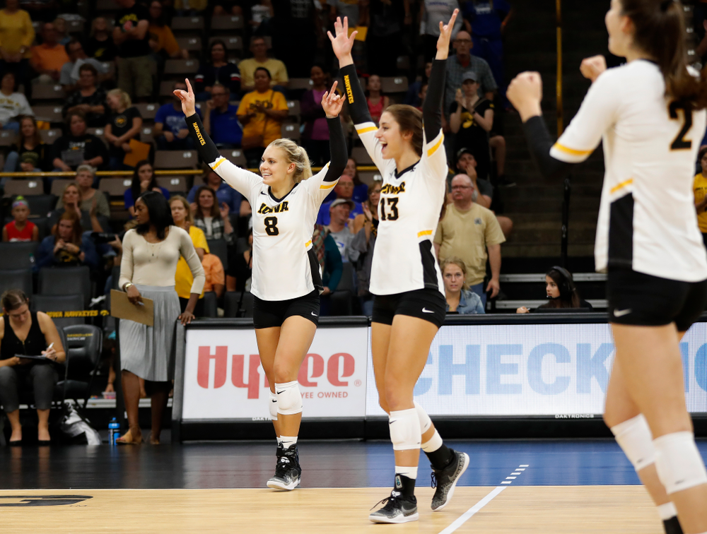 Iowa Hawkeyes right side hitter Reghan Coyle (8) and middle blocker Sarah Wing (13) against Eastern Illinois Sunday, September 9, 2018 at Carver-Hawkeye Arena. (Brian Ray/hawkeyesports.com)