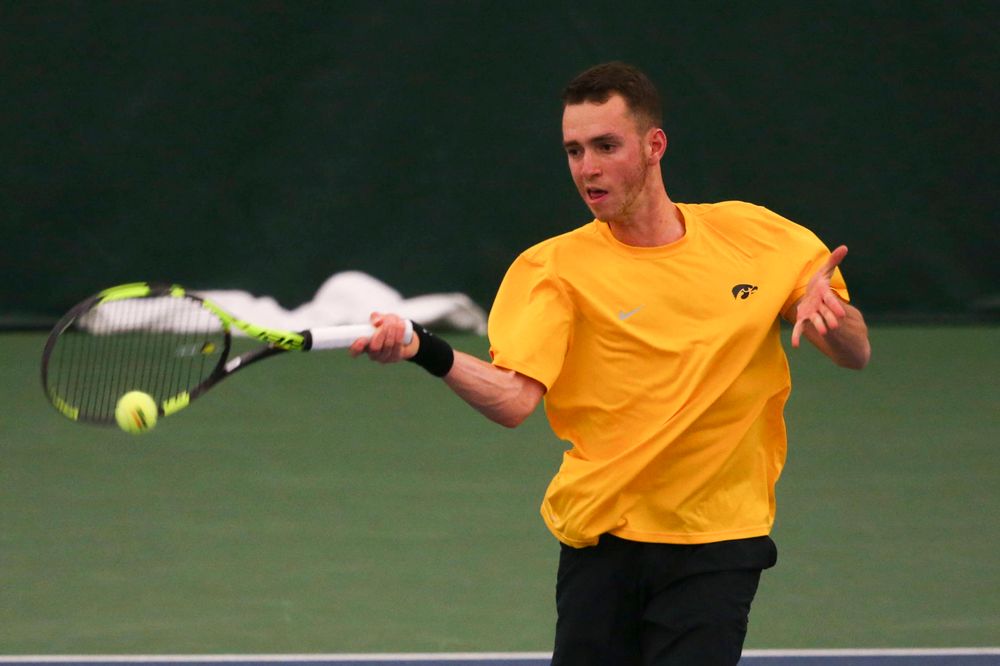 Iowa's Kareem Allaf at a tennis match vs Drake Friday, March 8, 2019 at the Hawkeye Tennis and Recreation Complex. (Lily Smith/hawkeyesports.com)