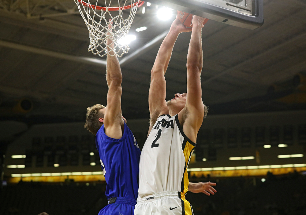 Iowa Hawkeyes forward Jack Nunge (2) dunks the ball during the first half of their exhibition game against Lindsey Wilson College at Carver-Hawkeye Arena in Iowa City on Monday, Nov 4, 2019. (Stephen Mally/hawkeyesports.com)
