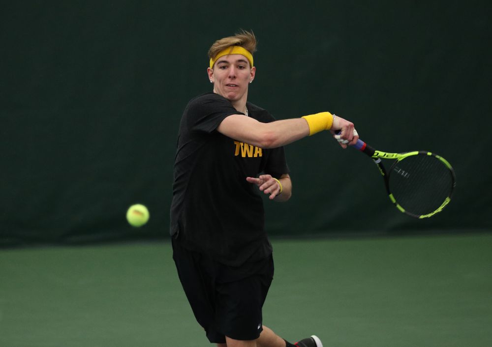Iowa's Nikita Snezhko against UMKC Friday, February 15, 2019 at the Hawkeye Tennis and Recreation Complex. (Brian Ray/hawkeyesports.com)